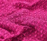 Jacquard acolchado fuxia